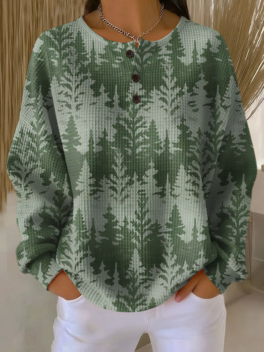 Inga™ - Julstickad tröja med klassiskt trämotiv